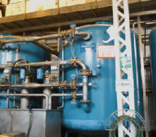 How did Carlsberg reduce power costs by 50 percent